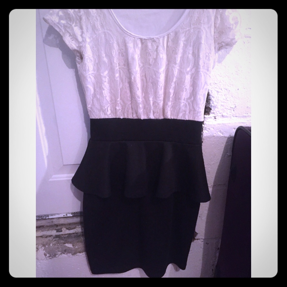 Small black & white dress with mid flare out